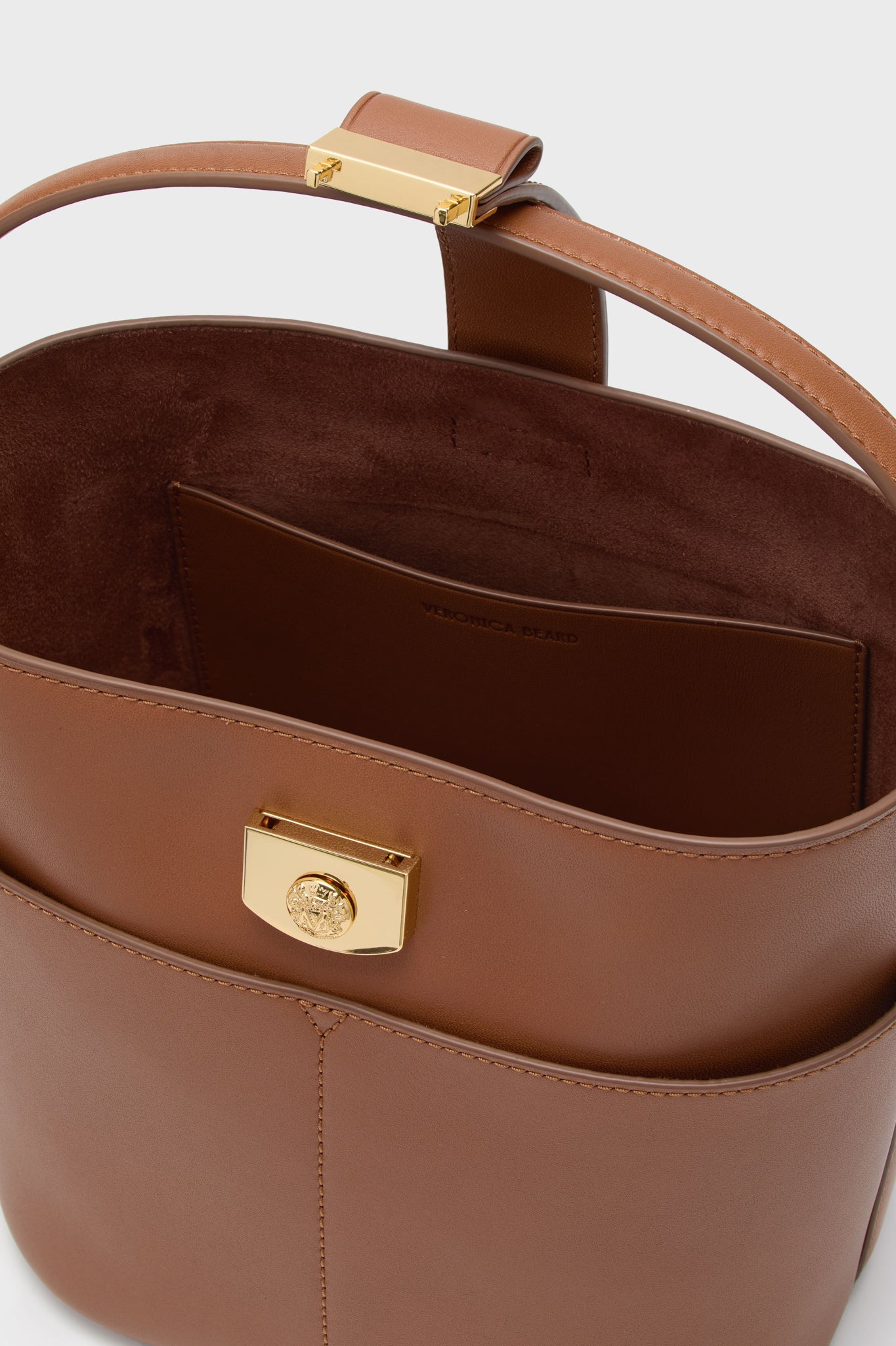 Hazelwood Small Crest Lock Bucket Bag